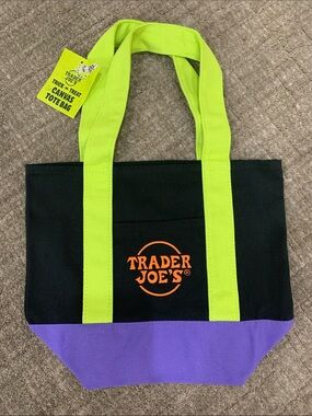 Trader’s Joe’s canvas tote with pockets. Great for carrying lunch, everyday use